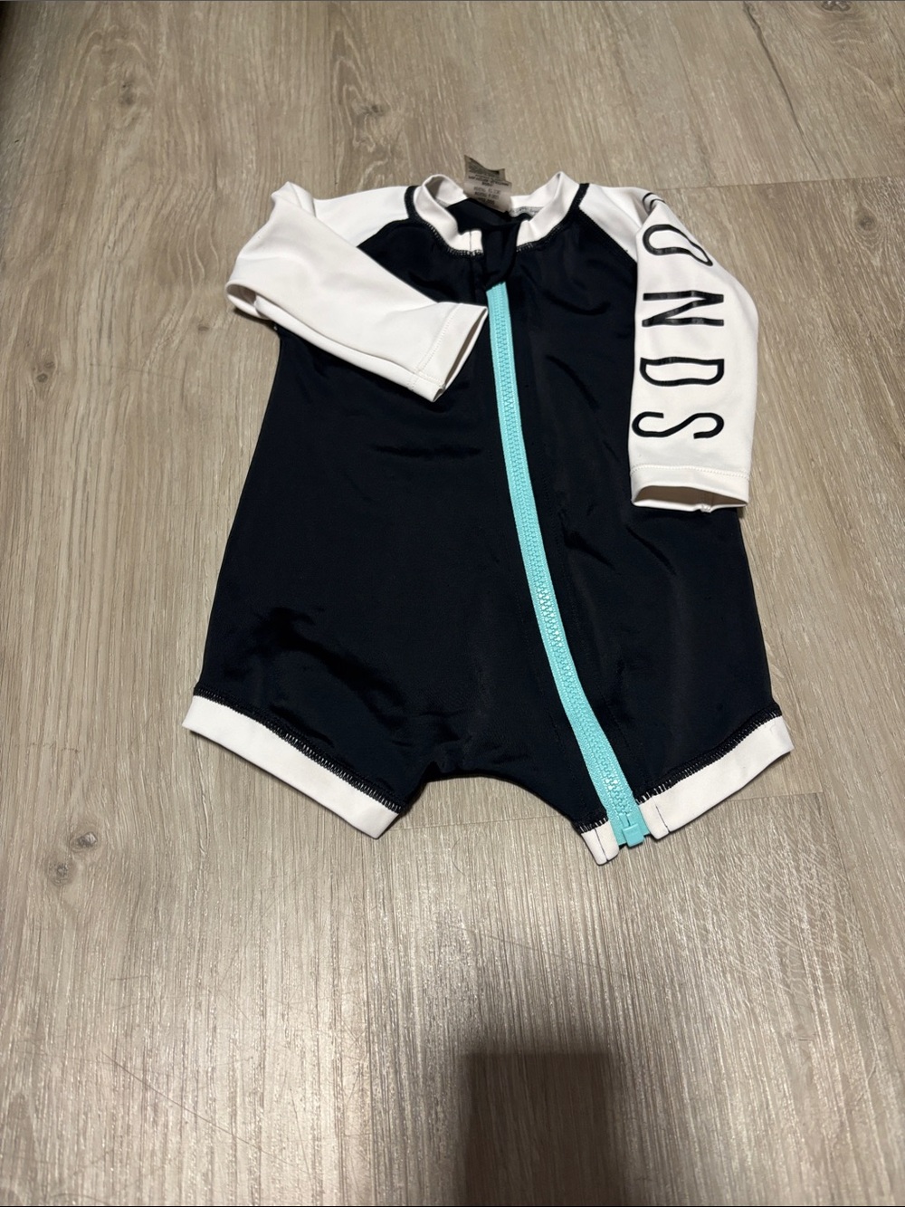 Bonds Kids Black and White One-Piece Swimsuit with Aqua Zip